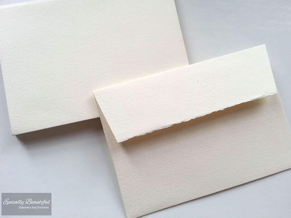 Photo of Luxury Handmade Envelopes Peachy-Cream Deckle Edge Flap C6 Peel and Seal. Top Down View.