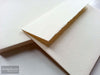 Photo of Luxury Handmade Envelopes Peachy-Cream Deckle Edge Flap C6 Peel and Seal. Side Angled View.
