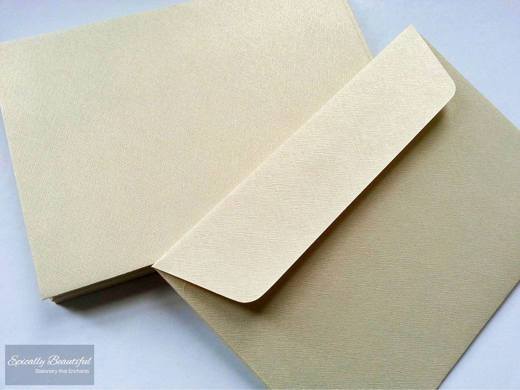 Photo of Textured Champagne Gold Square Flap C6 Peel and Seal Envelopes. Top Down View.