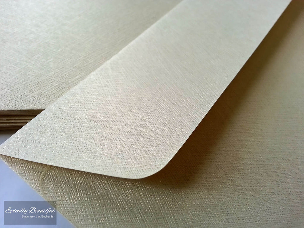 Photo of Textured Champagne Gold Square Flap C6 Peel and Seal Envelopes. Closeup View.