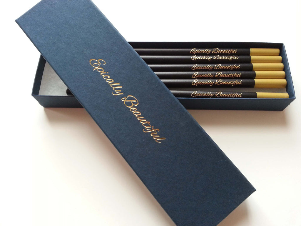 Photo of Epically Beautiful luxury stationery pencils. Top down view.