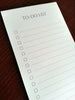 Modern Grey To Do List Notepads Angled Front View