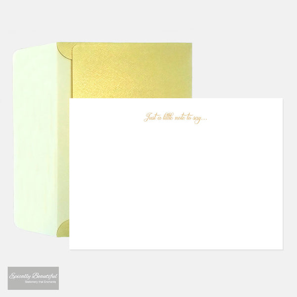 Photo of Just a little note to say... Gold foil correspondence cards. Full view with envelope in background.